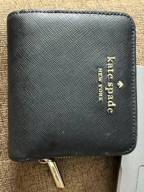 kate spade black zip coin pouch with gold-tone zipper